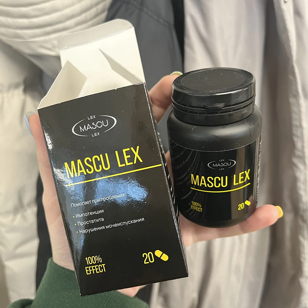 Баночка и картонная упаковка препарата для потенции Mascu Lex в руке