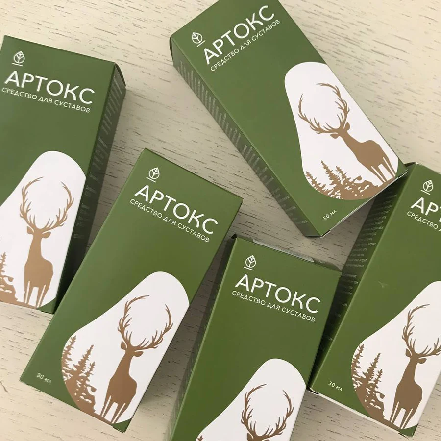 Пять упаковок геля Артокс лежат на столе