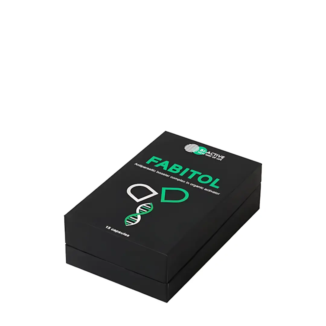 Упаковка препарата Fabitol, антипаразитарного комплекса в виде капель. На упаковке логотип и надпись 'Fabitol' с информацией о 15 капсулах.