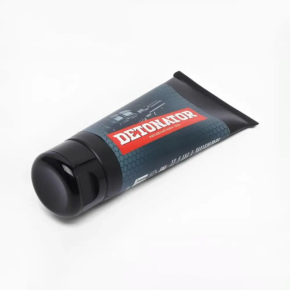 Тюбик тёмного цвета с надписью "Detonator" на красном фоне